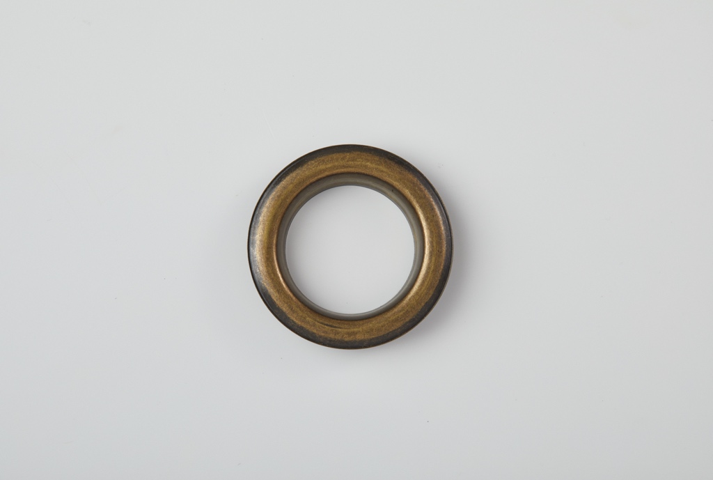 Eyelet in Antique Brass
